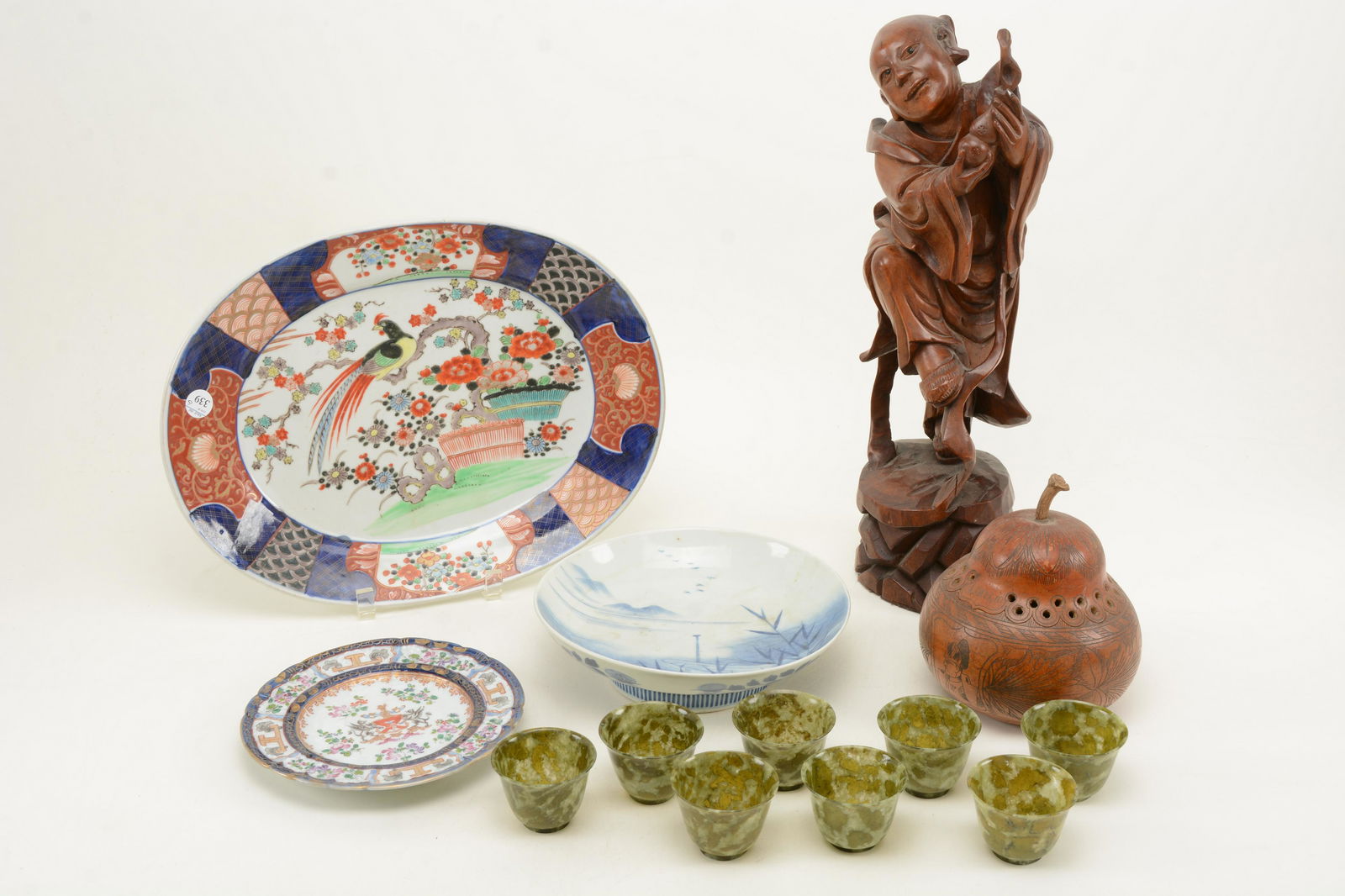 Chinese and Japanese porcelain and carvings. Includes (1 of 13)