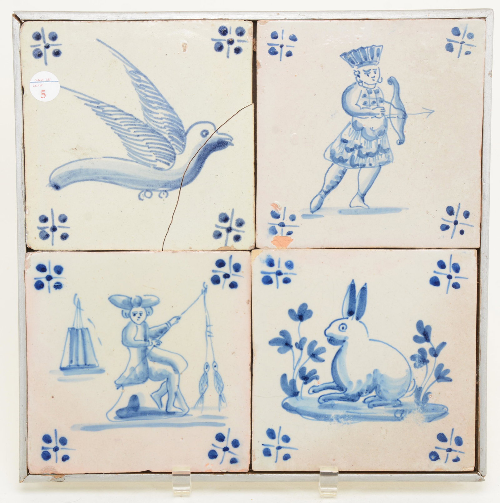 Set of 4 Spanish faience tiles, 17/18th Century. Framed: Set of 4 Spanish faience tiles, 17/18th Century. Framed together with figure and animal decorations including Native American. Each tile 5.25 x 5.25 in. Overall 12 x 12in.