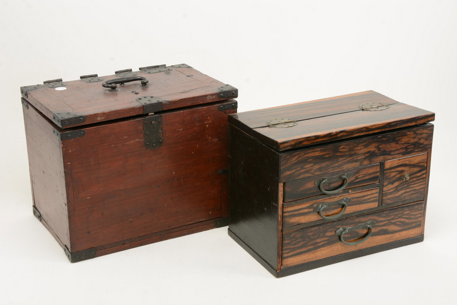 2 Chinese boxes, early 20th Century. One with lift top,: 2 Chinese boxes, early 20th Century. One with lift top, iron fittings and lock the other for keeping writing tools with zebra wood veneers. Height 9.5in, width 8.5 in, depth 12.25in and height 9 in, w