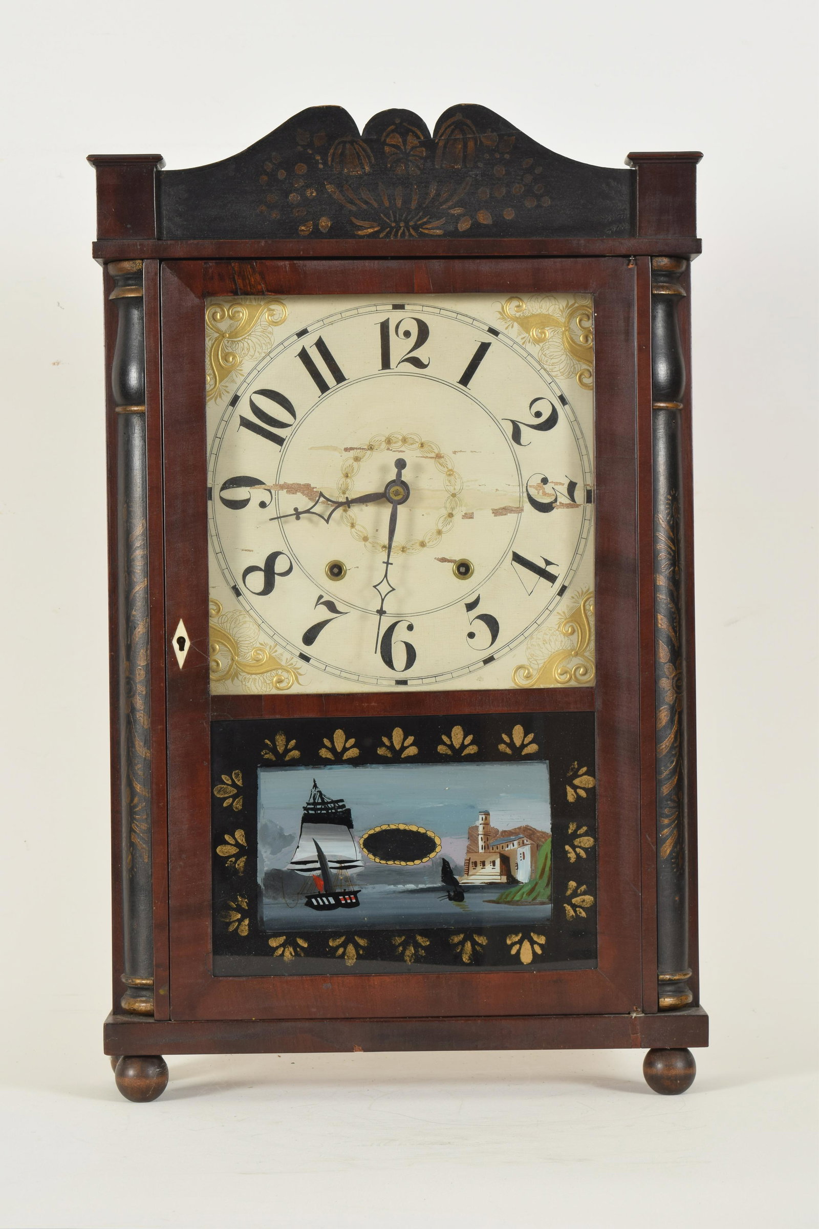 Seymour, Williams and Porter shelf clock, Connecticut: Seymour, Williams and Porter shelf clock, Connecticut 19th century. Arabic dial, striking mechanism, shaped crest and quarter column with gilt floral decoration, reverse painted panel depicting a wate
