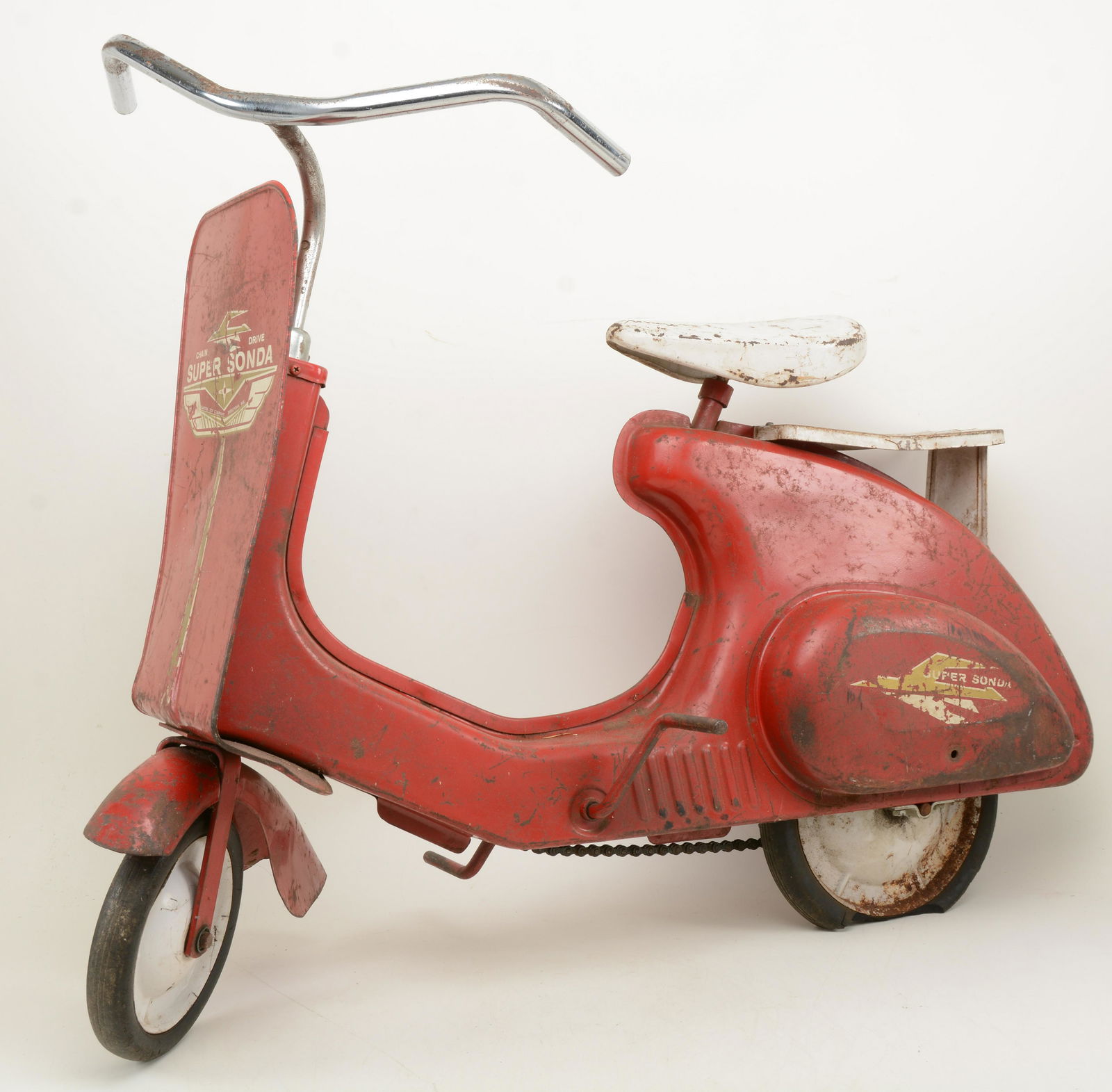 1950s original painted steel chain drive super Sonda: 1950s original painted steel chain drive super Sonda peddle scooter. With back passenger seat. Original finish. Some wear consistent with age and use. 29 in height.