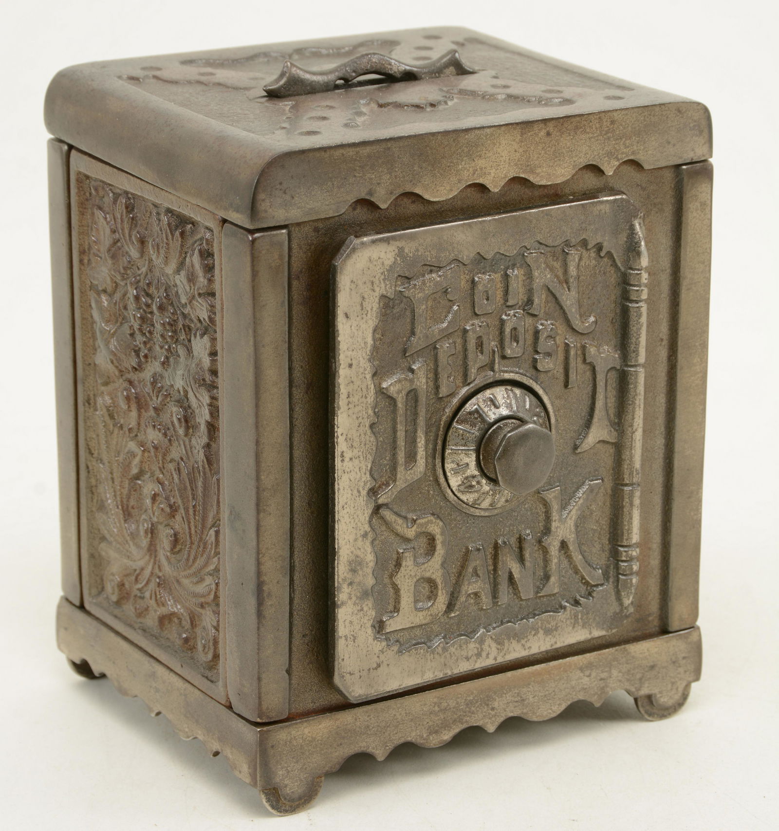 Cast iron coin deposit bank with combination lock. (1 of 8)