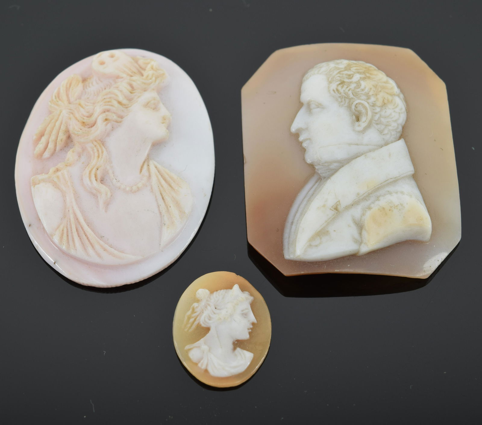 3 carved shell cameos. 1) pink with relief carved (1 of 6)