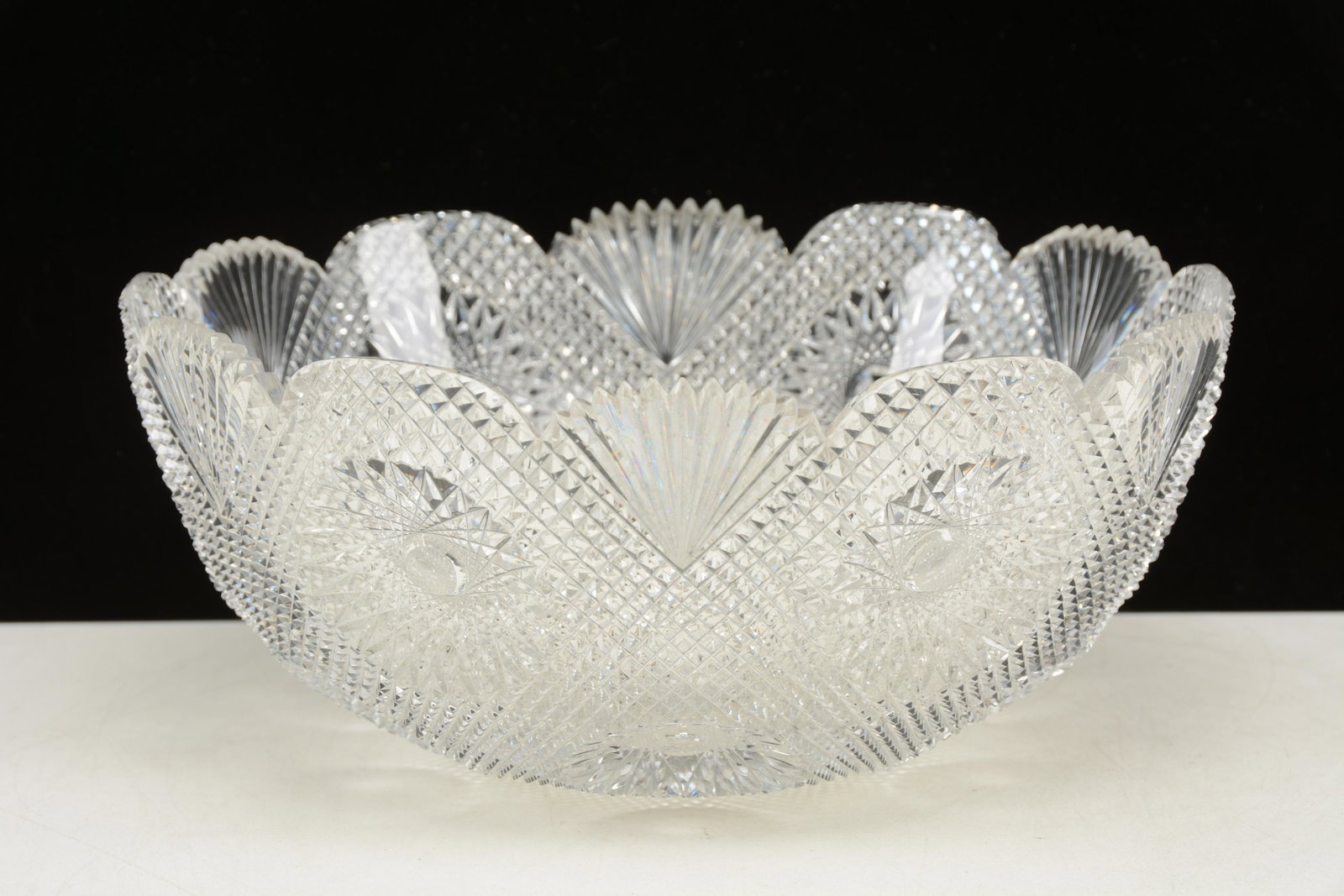 American Brilliant cut glass bowl with unusual diamond,: American Brilliant cut glass bowl with unusual diamond, pineapple and fan decoration. Extremely sharp, deep cut. Appears to be without large chips. There are diamond point missing and small nicks and 