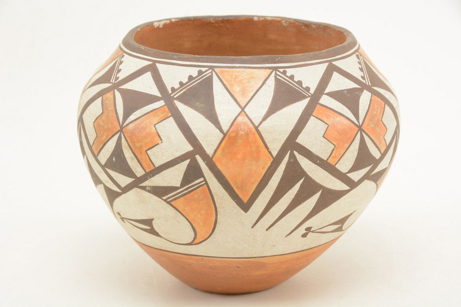 Southwest Native American painted pottery vessel. Brown (1 of 10)
