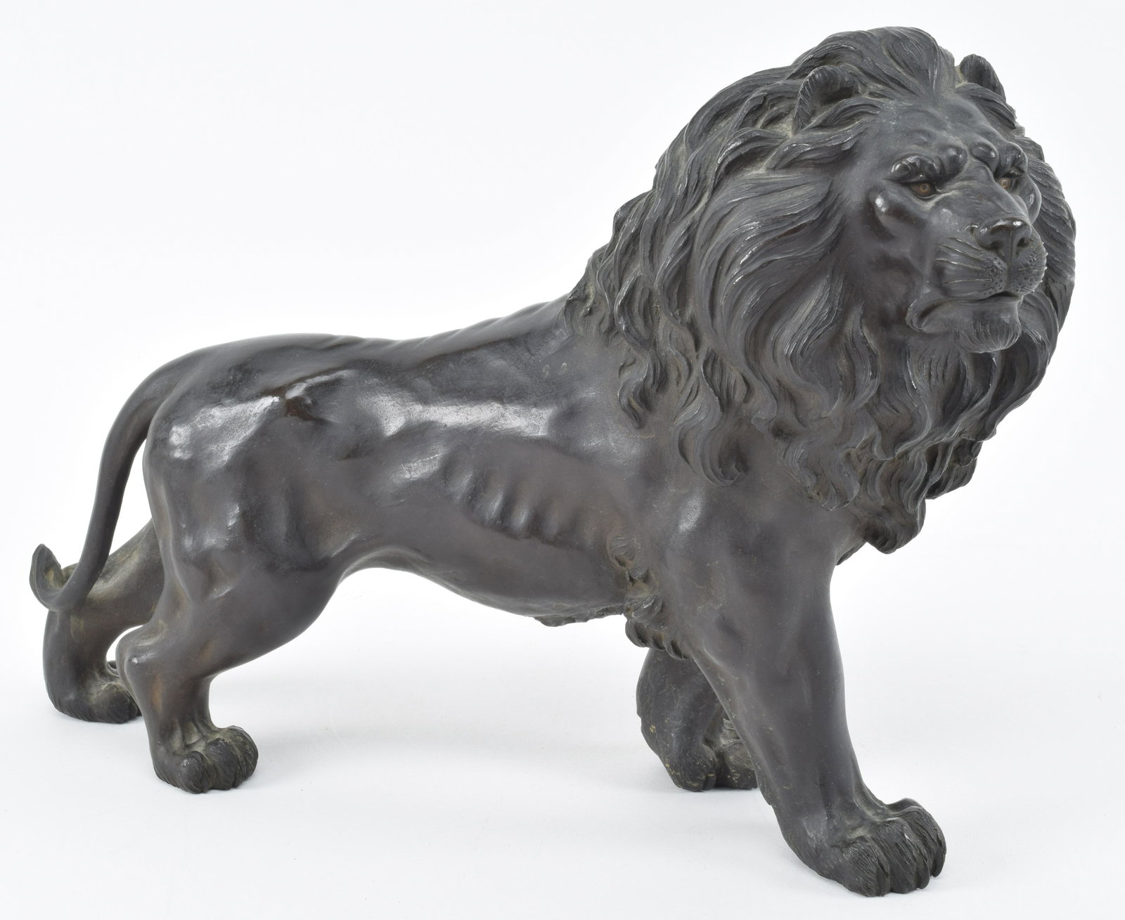 Bronze lion. Japan. Meiji period (1868-1912). Signed.: Bronze lion. Japan. Meiji period (1868-1912). Signed. 13in x 9.5in.
