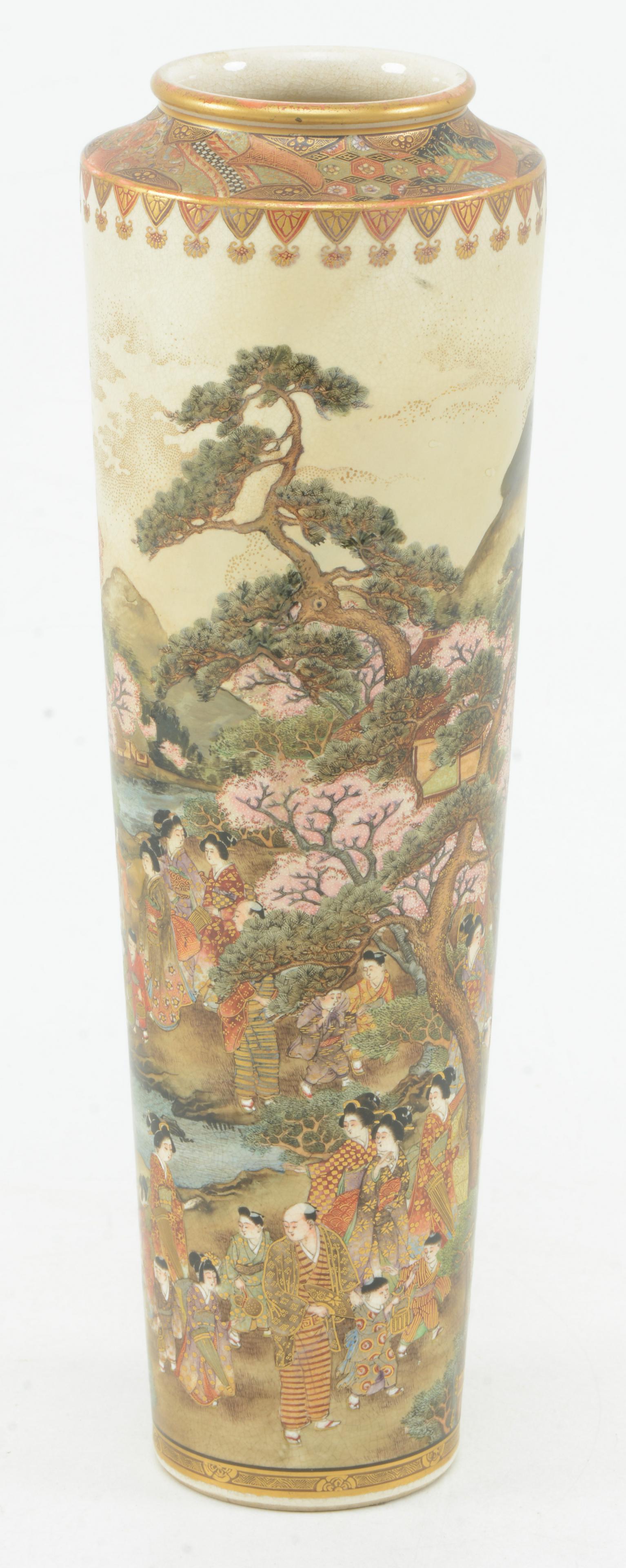 Satsuma vase. Japan. Meiji period (1868-1912).: Satsuma vase. Japan. Meiji period (1868-1912). Stoneware. Graduated cylindrical form. Scene of a garden party. Signed. Repaired. 12in high.