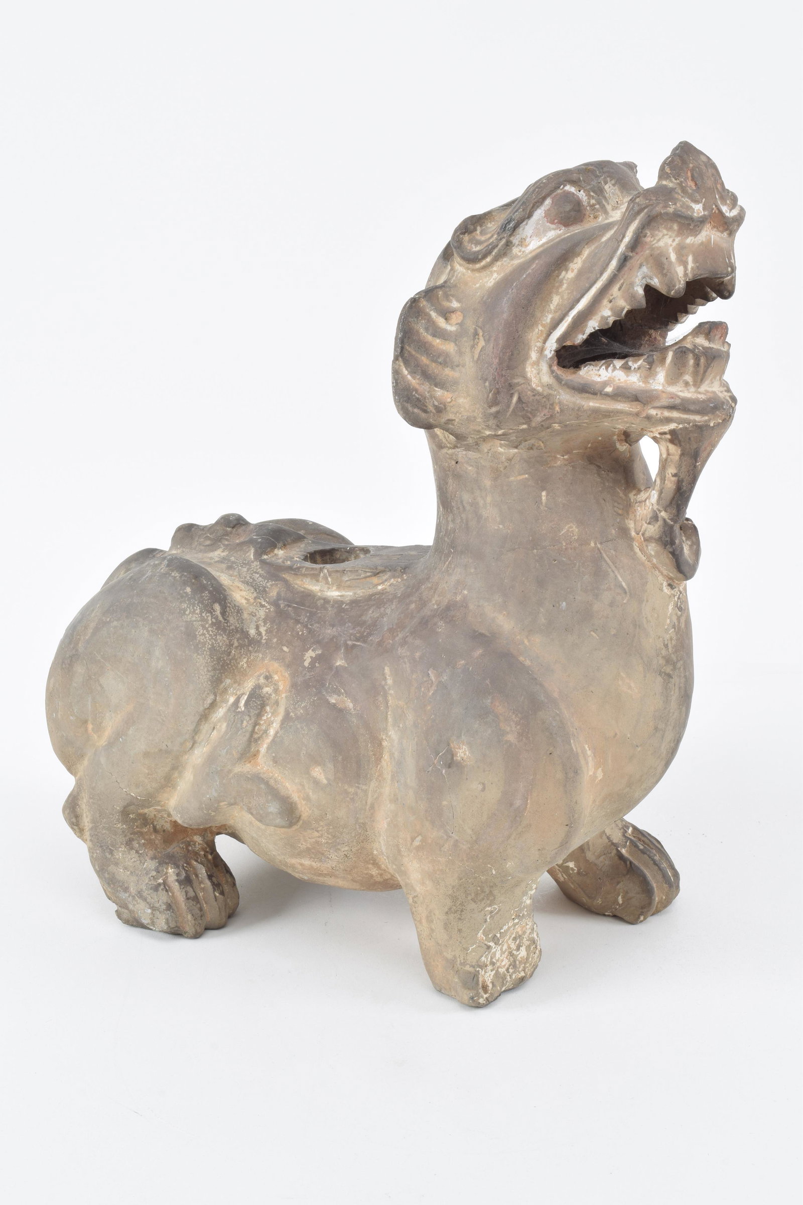 Pottery lion. China. Possibly Han period (206 B.C. -: Pottery lion. China. Possibly Han period (206 B.C. - 220 A.D.). 10 x 11in. Losses. Provenance: Dr. Paul Herman Ludwig Kempner and Margaret Von Mendelssohn Kempner, Berlin; By descent to Maximilian Wal