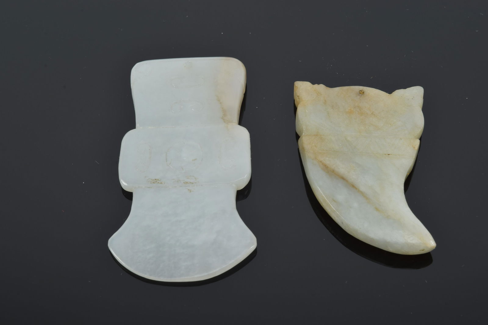 Pair of jade pendants. China. 20th century. Largest (1 of 7)