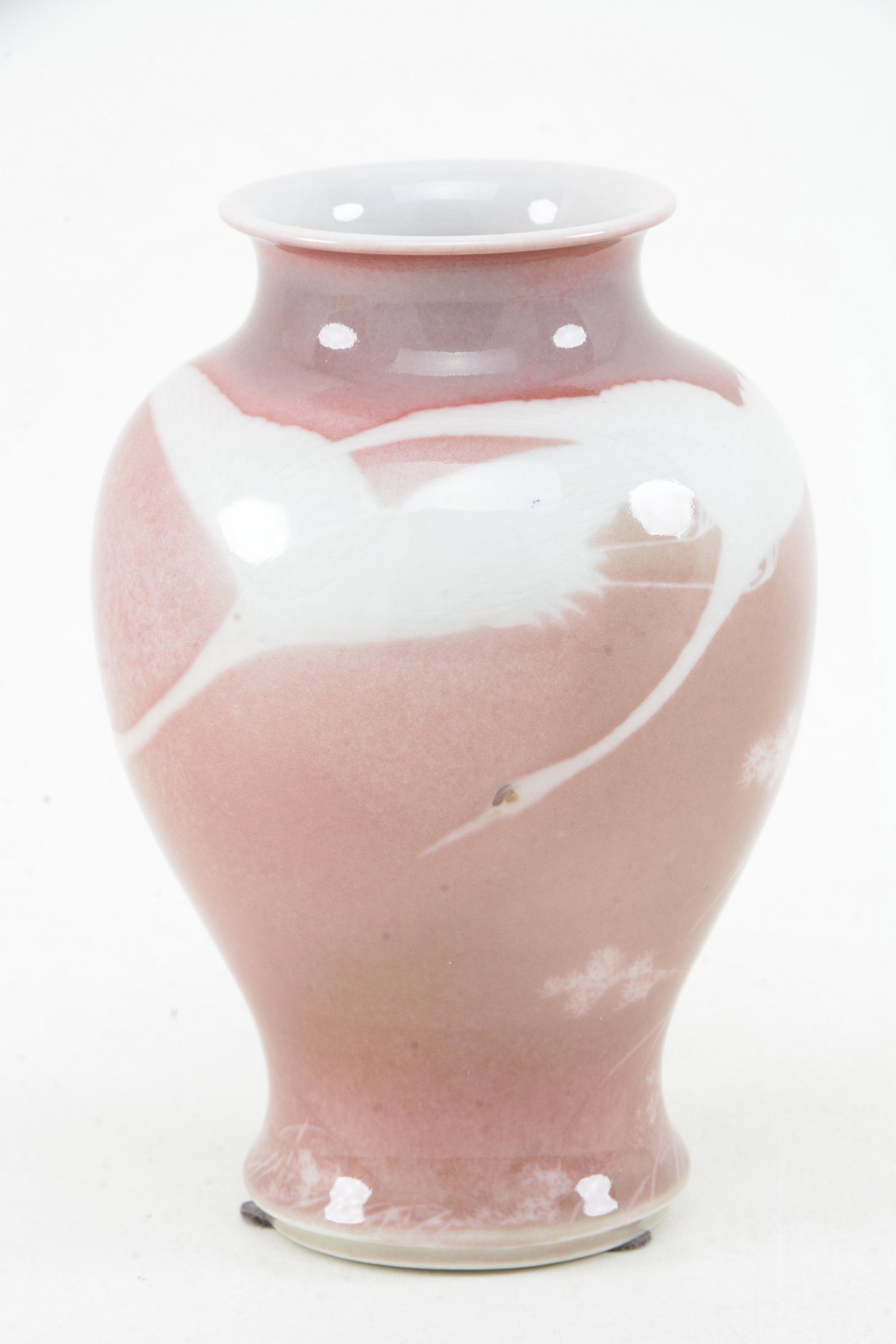 Porcelain vase. Japan. Meiji period (1868-1912).: Porcelain vase. Japan. Meiji period (1868-1912). Decoration of geese and autumn grasses on an underglaze red ground. Signed Makuzu Kozan. 6.5in high.