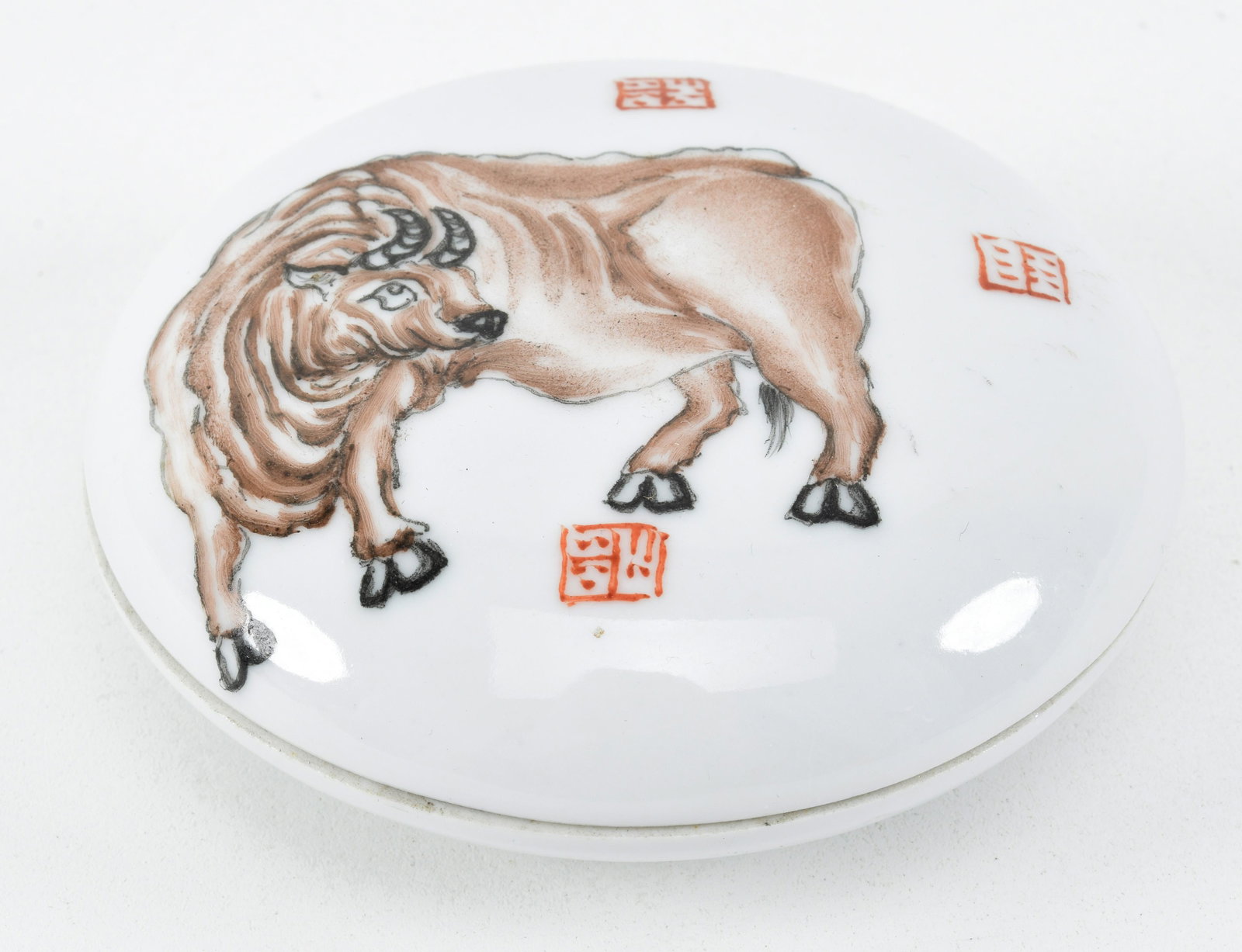 Seal paste box. China. Republic period, ca. 1930.: Seal paste box. China. Republic period, ca. 1930. Decoration of an ox with 3 seals. Signed on the base. 3.75in D.