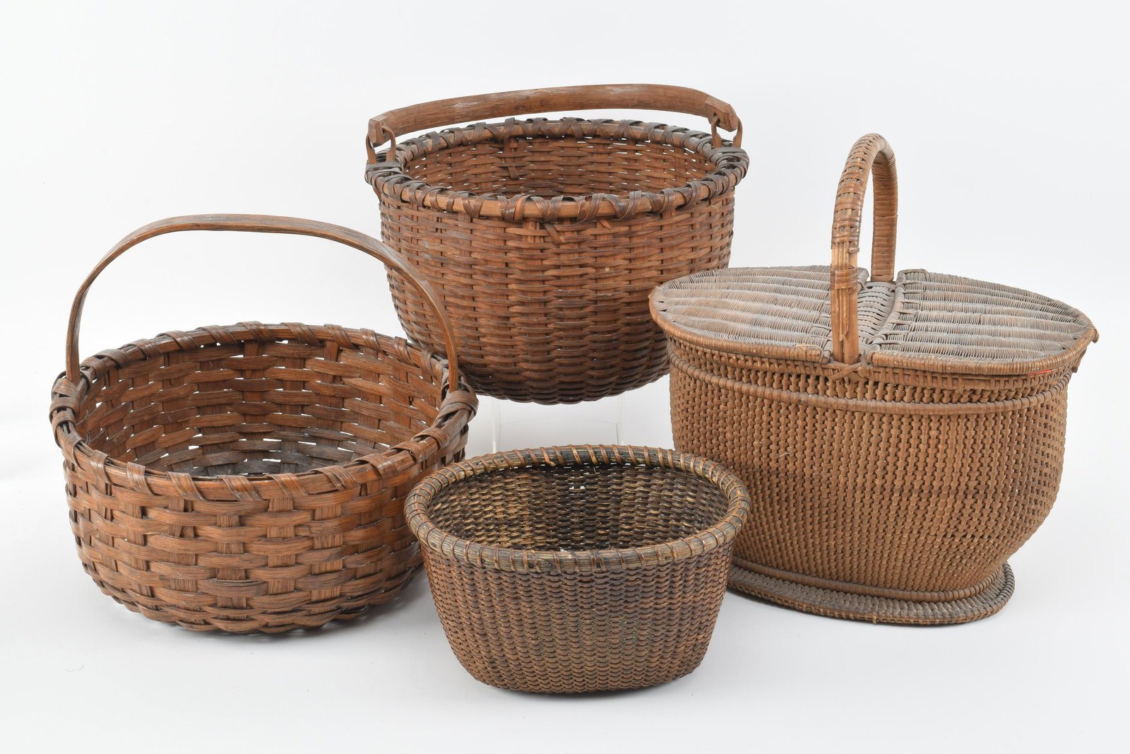 Primitive hand woven baskets. Early to late 20th (1 of 13)
