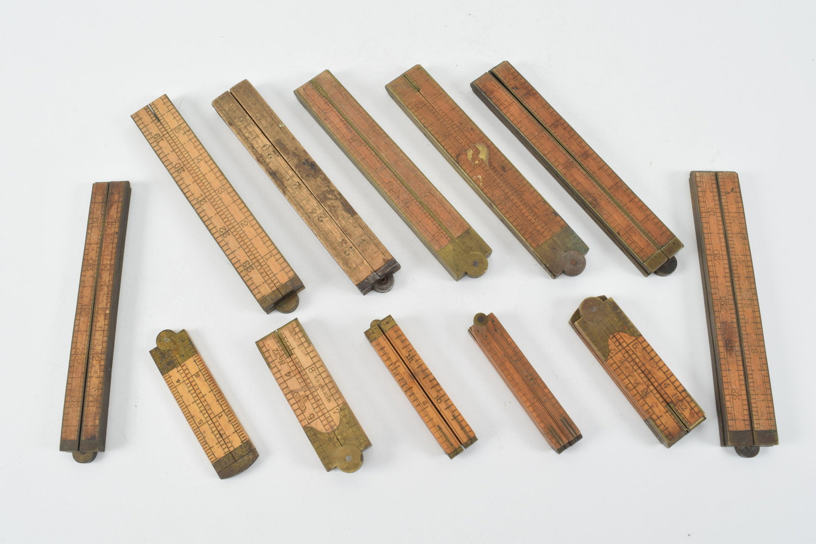 Lot of early Stanley folding rules. 8 marked Stanley (1 of 12)