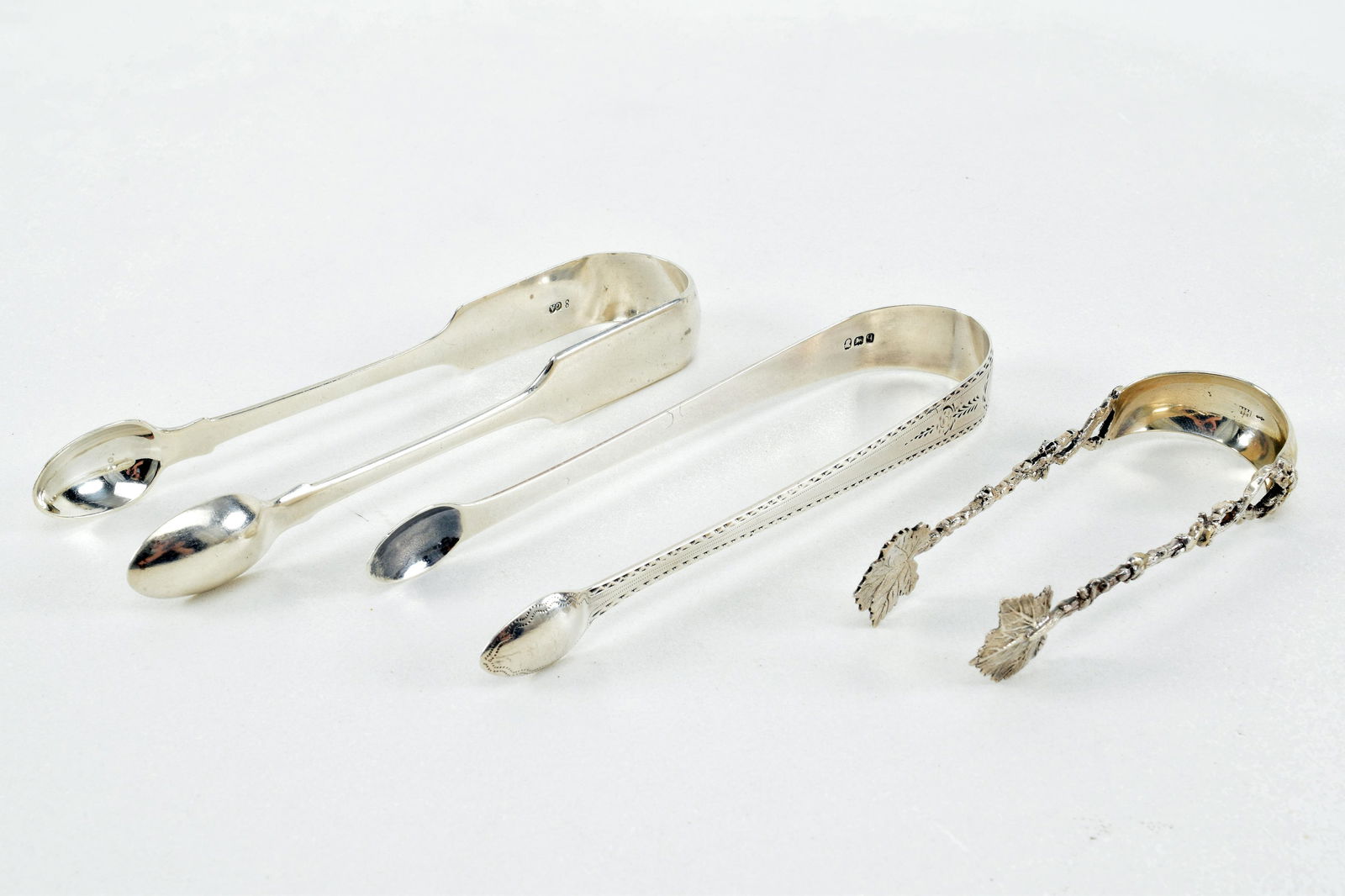 English and Dutch silver tongs. 1) English sterling (1 of 10)