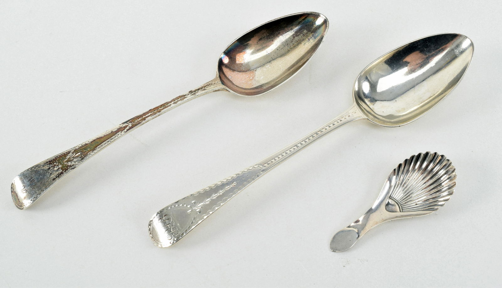 English Georgian sterling silver spoons. To include: 1) (1 of 9)