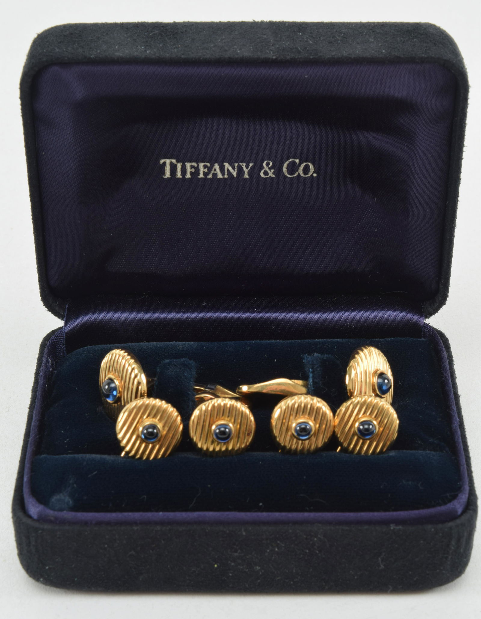 18K Tiffany & Co. gold and cabochon sapphire stud set, (1 of 4)