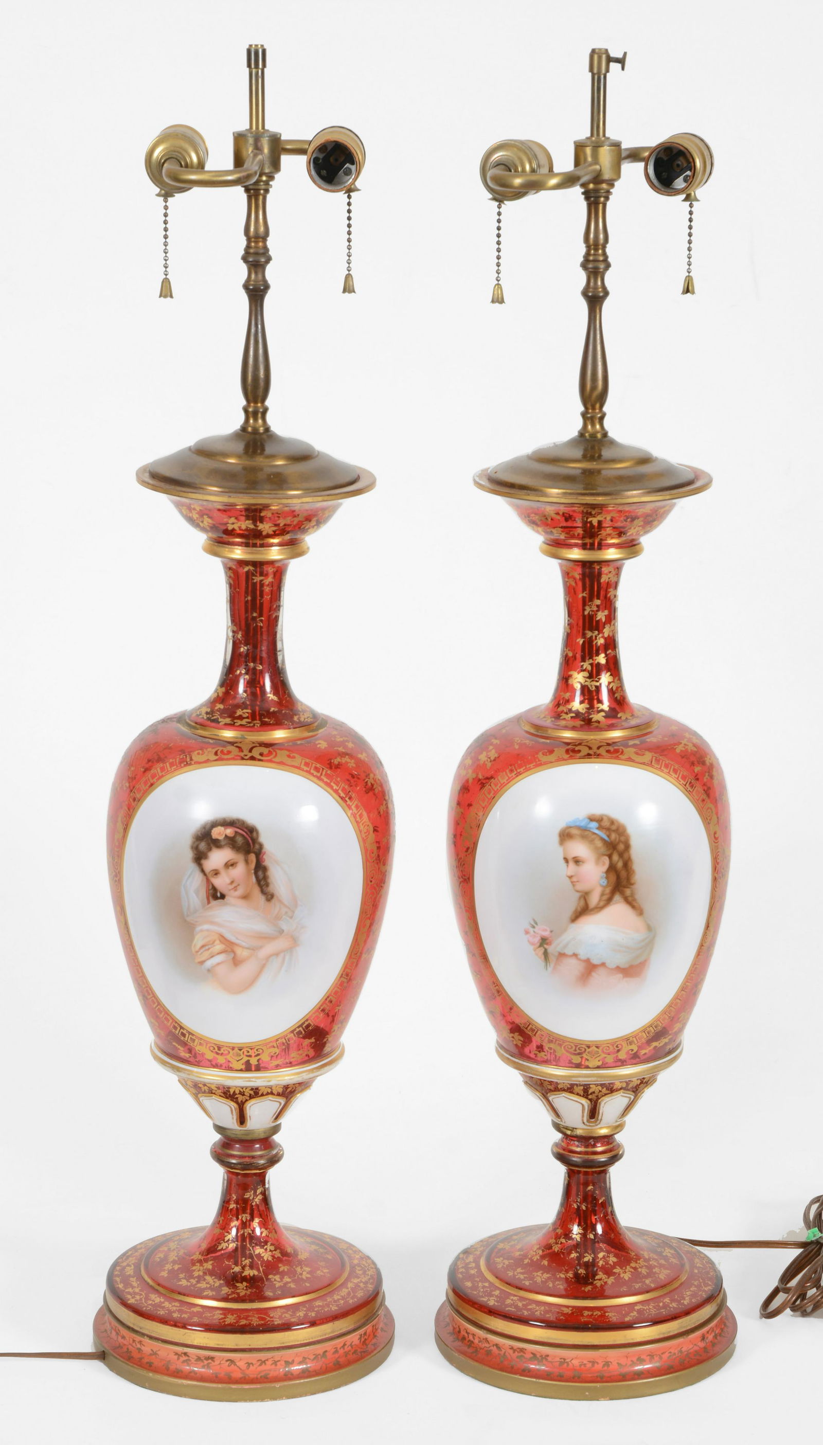 Pair of red glass portrait vases mounted as lamps. Hand (1 of 8)
