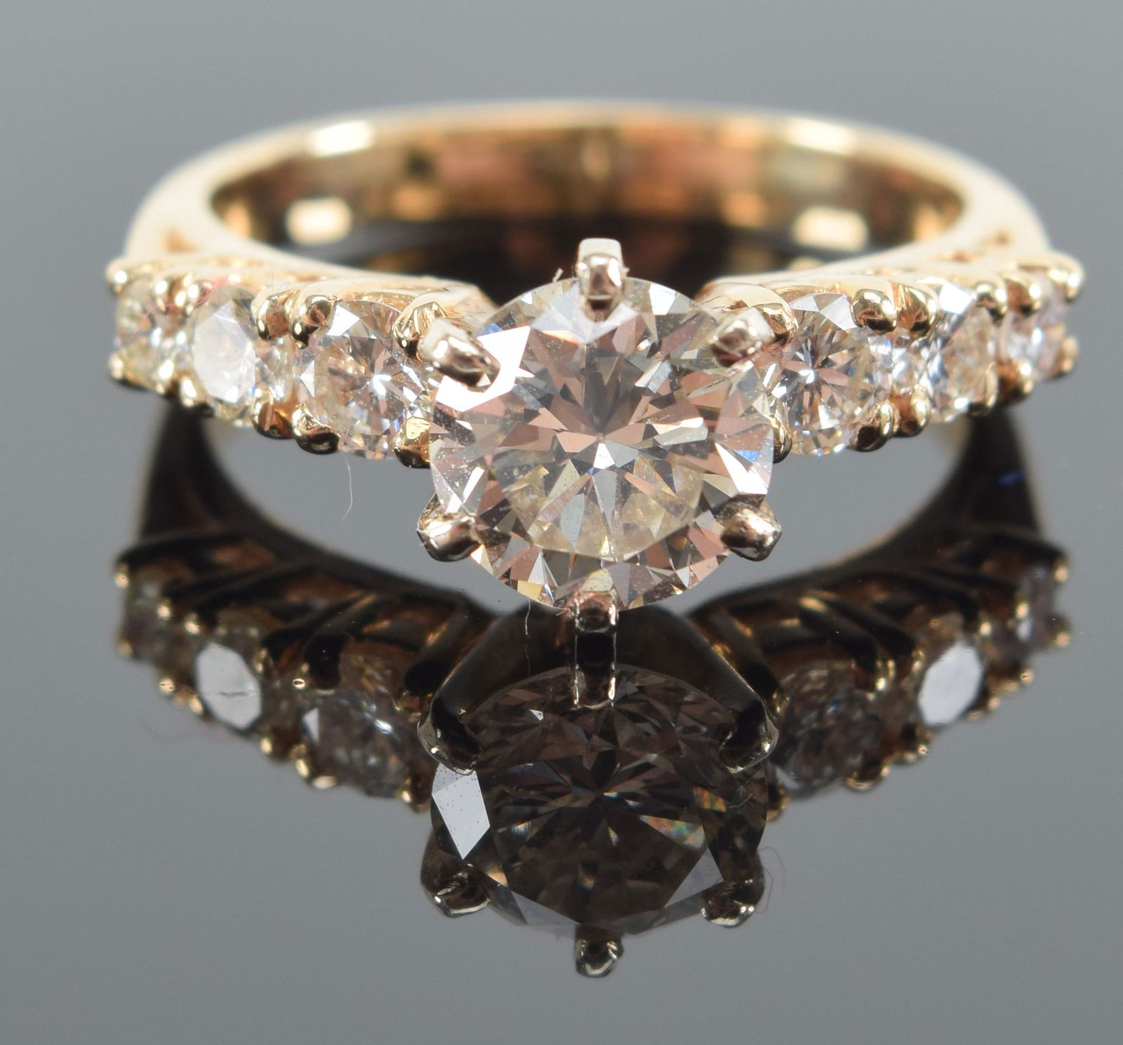 14 kt gold diamond solitaire engagement ring. Round (1 of 9)