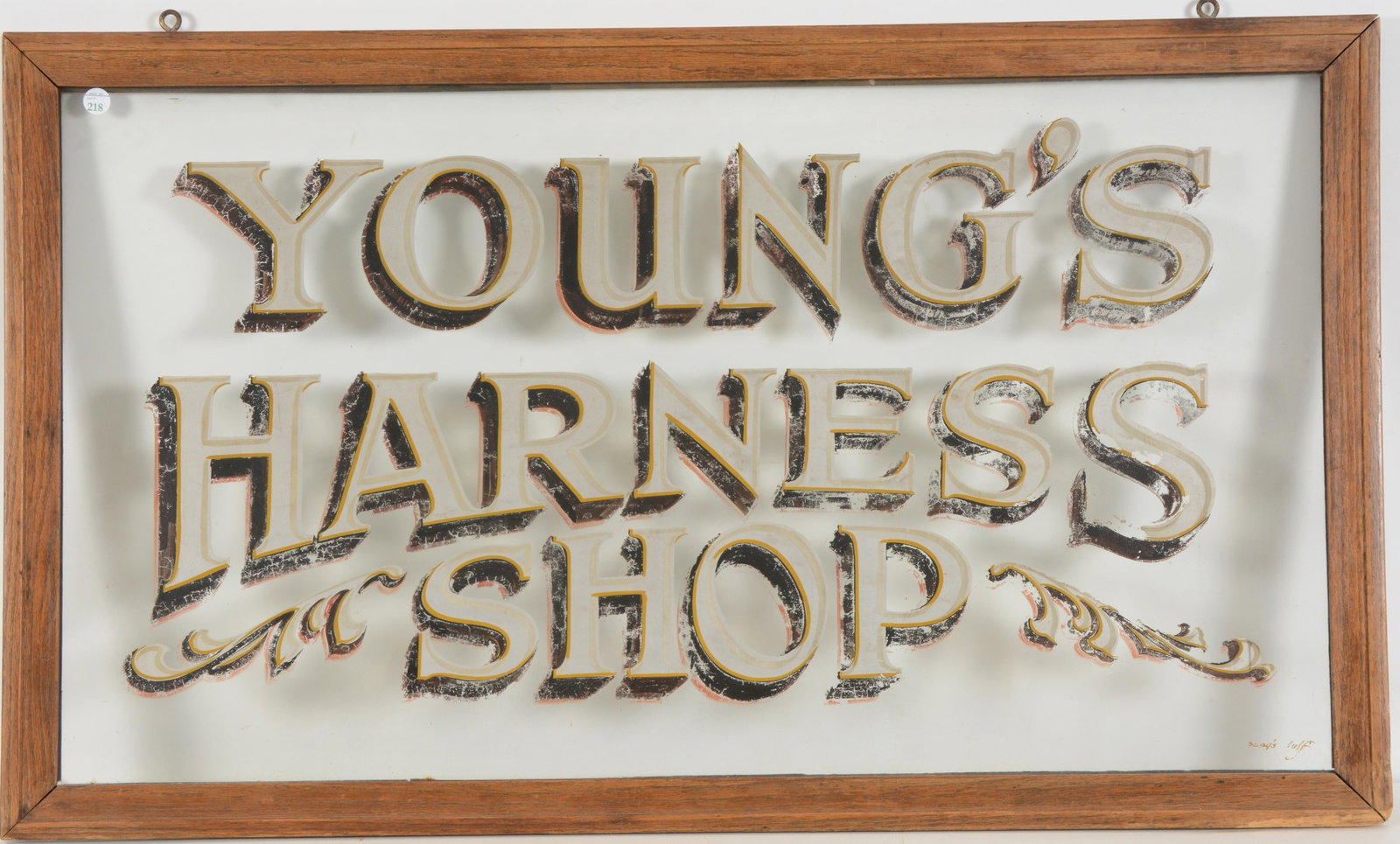 Painted glass trade sign late 19th Century, Youngs: Painted glass trade sign late 19th Century, Youngs Harness Shop, Winchester New Hampshire. In oak frame. 22.5 x 38.25 in