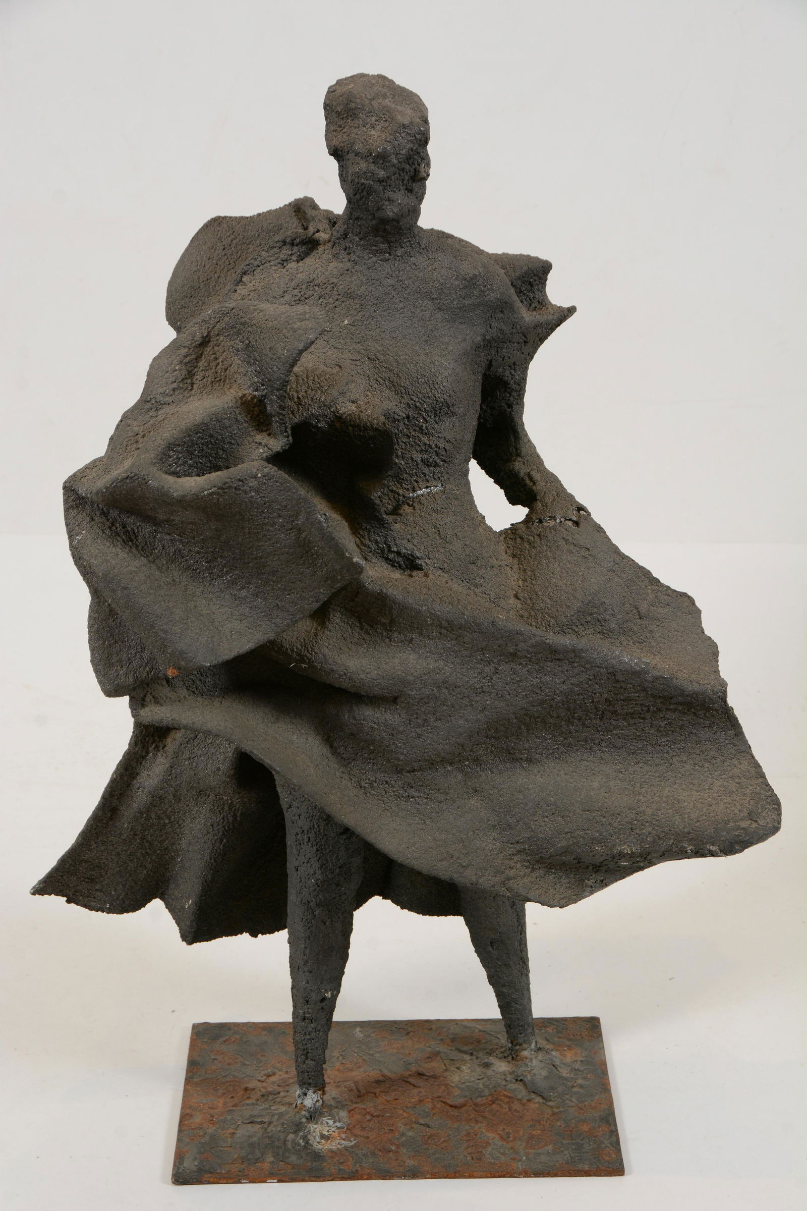 Brutalist metal sculpture of a robed figure. Unsigned. (1 of 7)