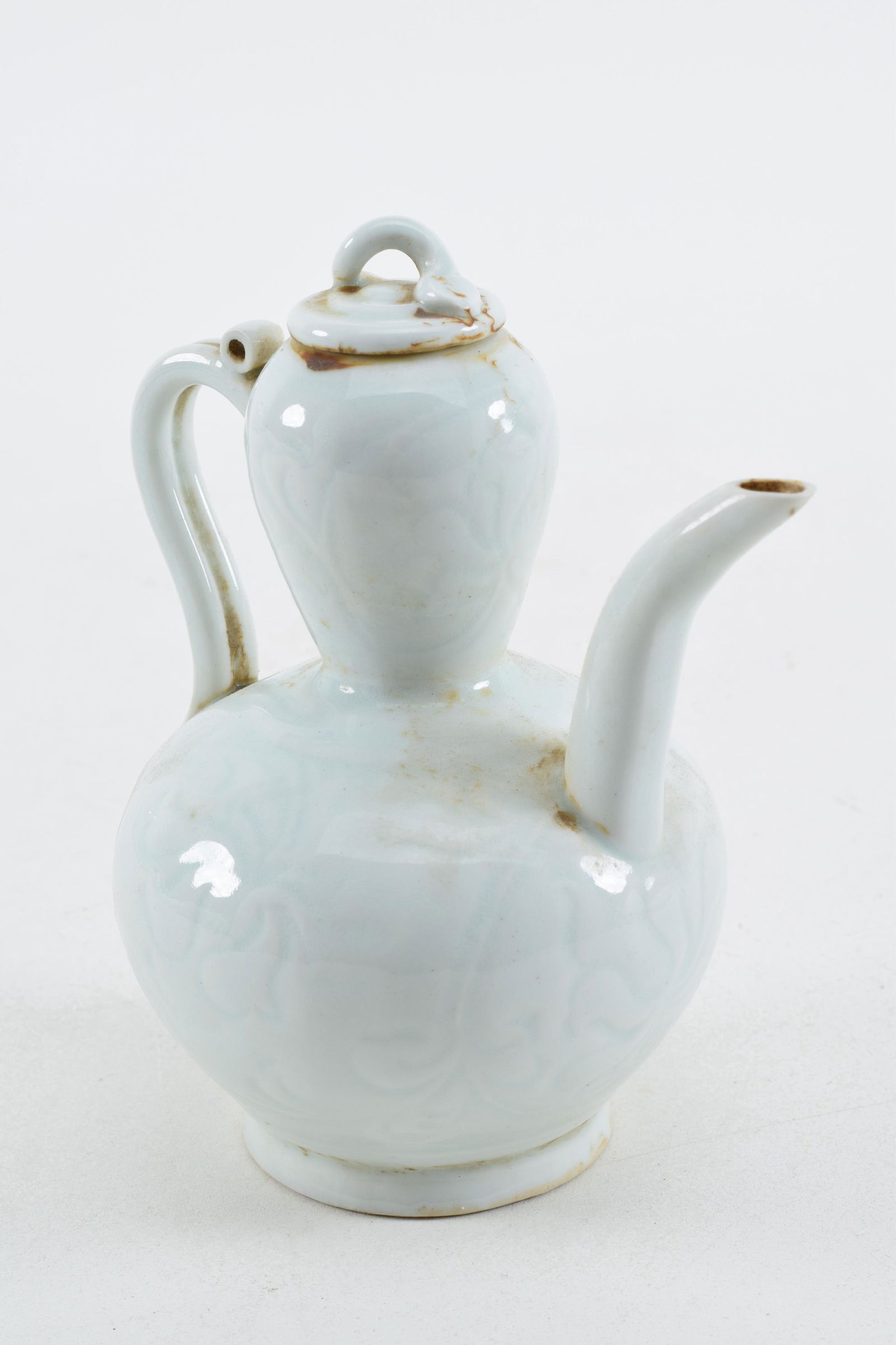 Chinese pale celadon glazed porcelain covered ewer. (1 of 5)