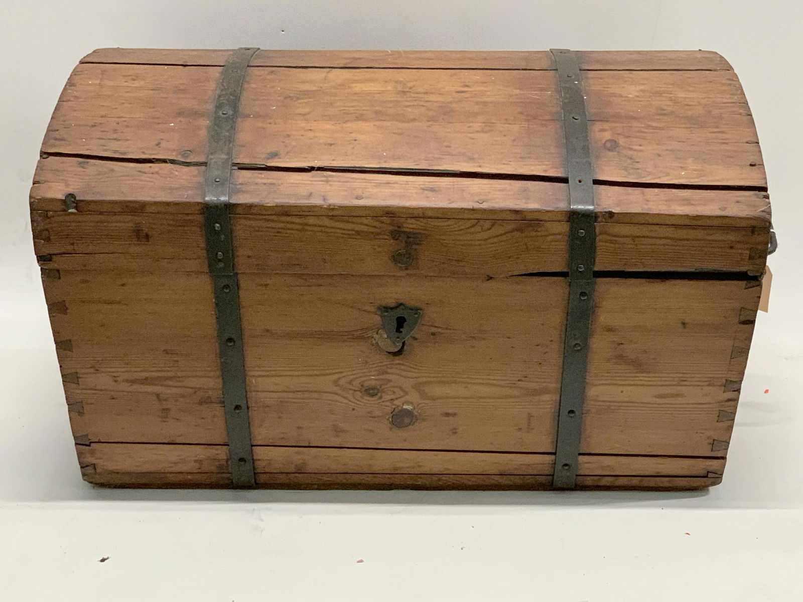 Pine domed top and iron bound trunk with iron handles, (1 of 4)