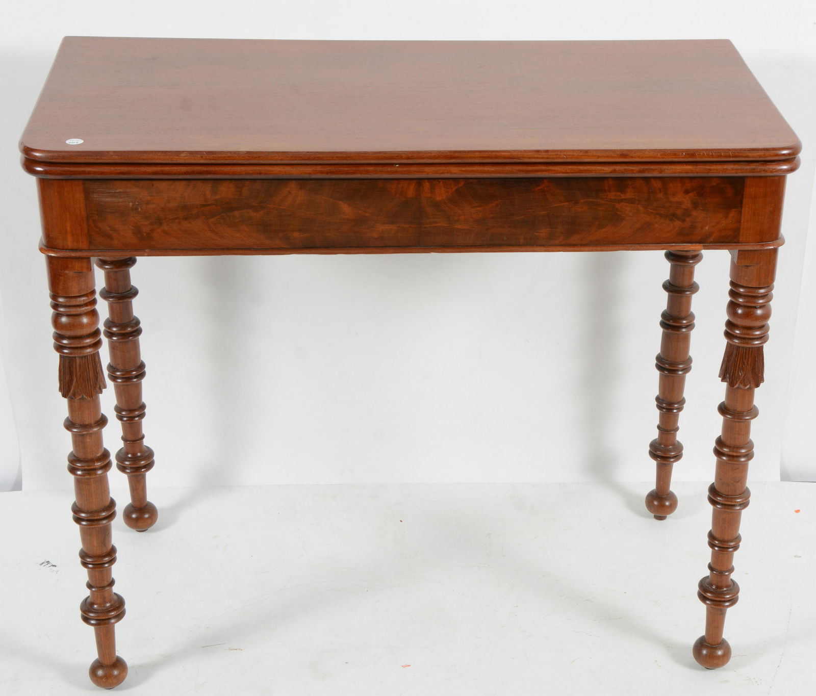 Sheraton mahogany games table with disc turned legs. (1 of 7)