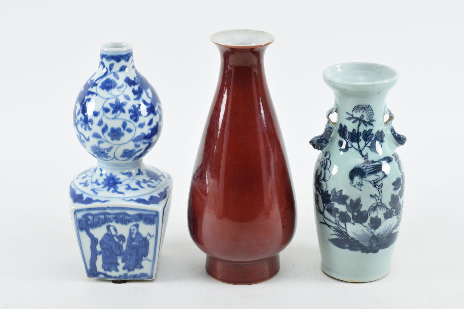 3 Chinese porcelain vases. 1) Oxblood glaze footed (1 of 8)