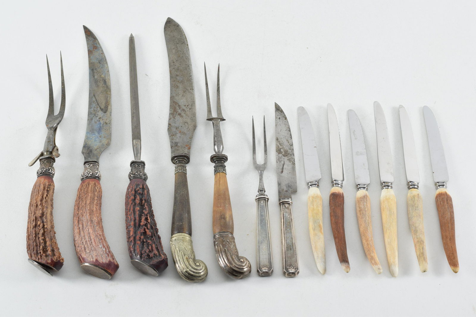 Assortment of 13 stag handled carving sets and knives. (1 of 5)