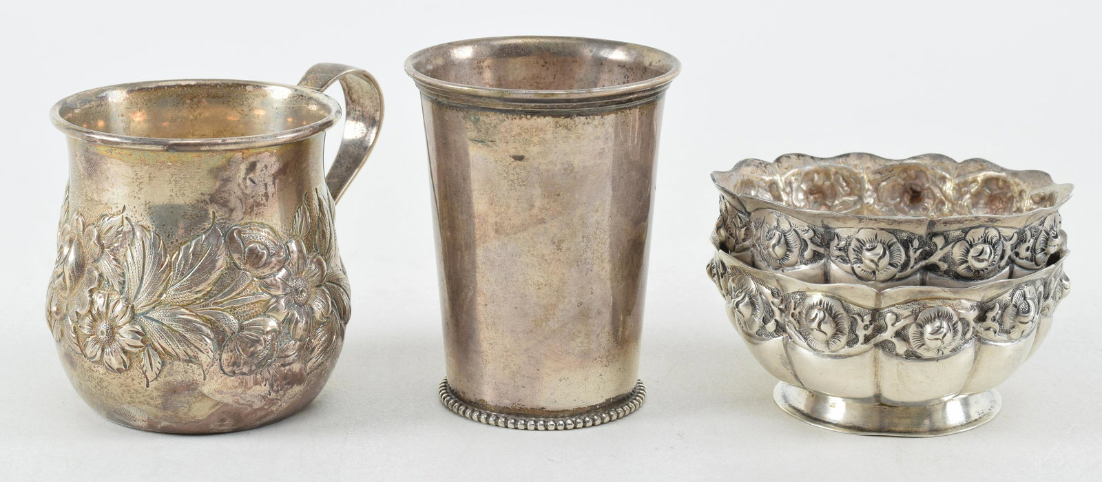 4 silver items. 1) Pair of Heather Mexican sterling silver dishes with floral repousse bands. (1 of 8)