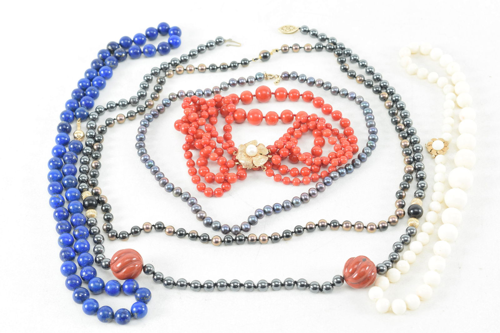 Necklace lot including a marked 14K gold and pearl clasp red bead necklace. A 14K gold clasp white (1 of 11)