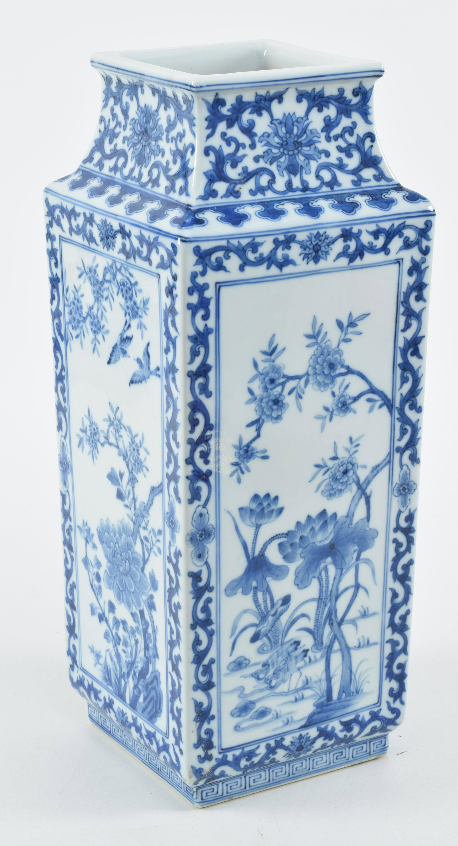 Porcelain vase. China. Early 20th century. Square form. Underglaze blue decoration of birds, insetcs: Porcelain vase. China. Early 20th century. Square form. Underglaze blue decoration of birds, insetcs and flowers. Chien Lung mark. 14.25in high.