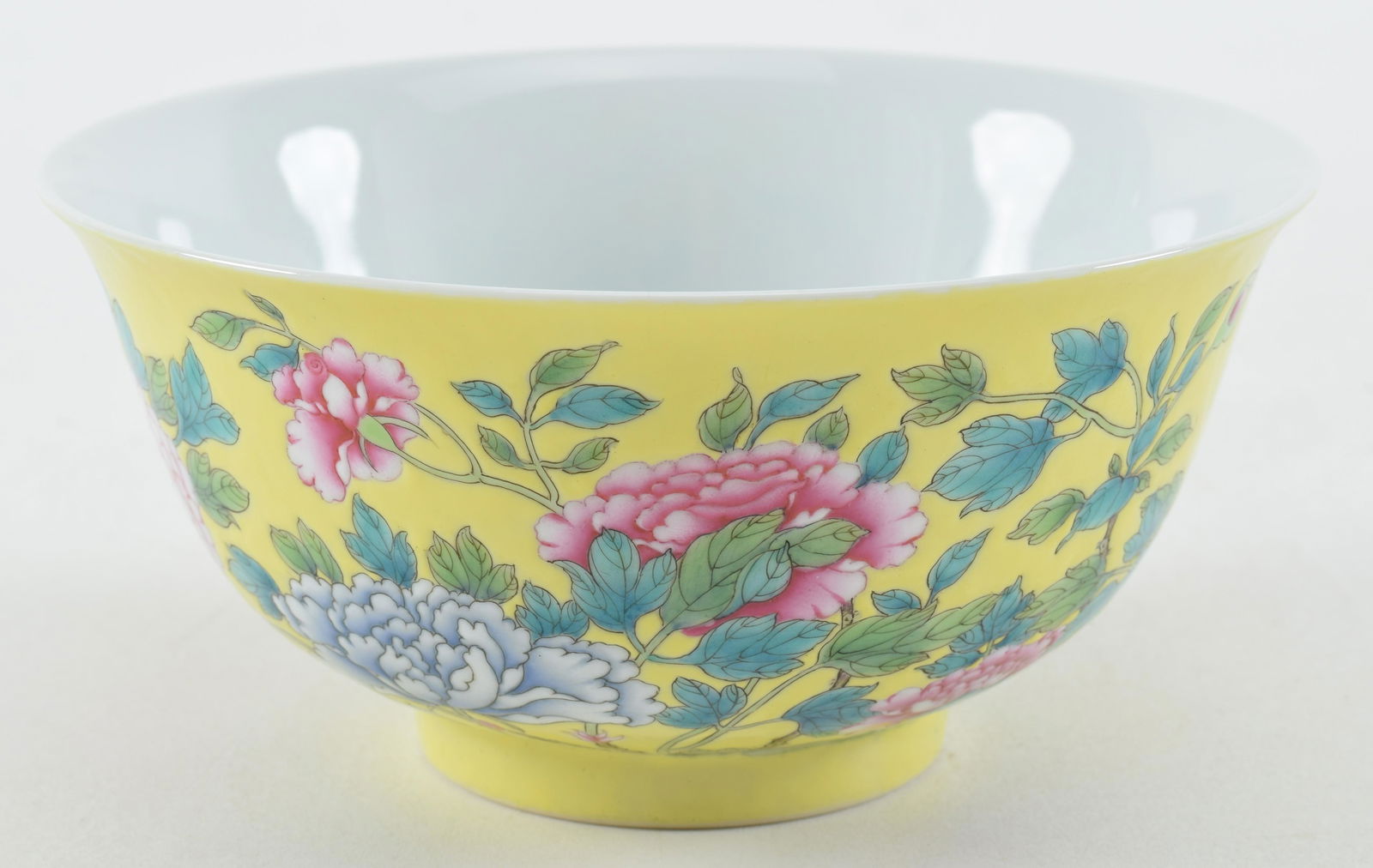 Porcelain bowl. China. 20th century. Yellow ground with flowers. Yung Cheng mark. 6in diameter. (1 of 5)