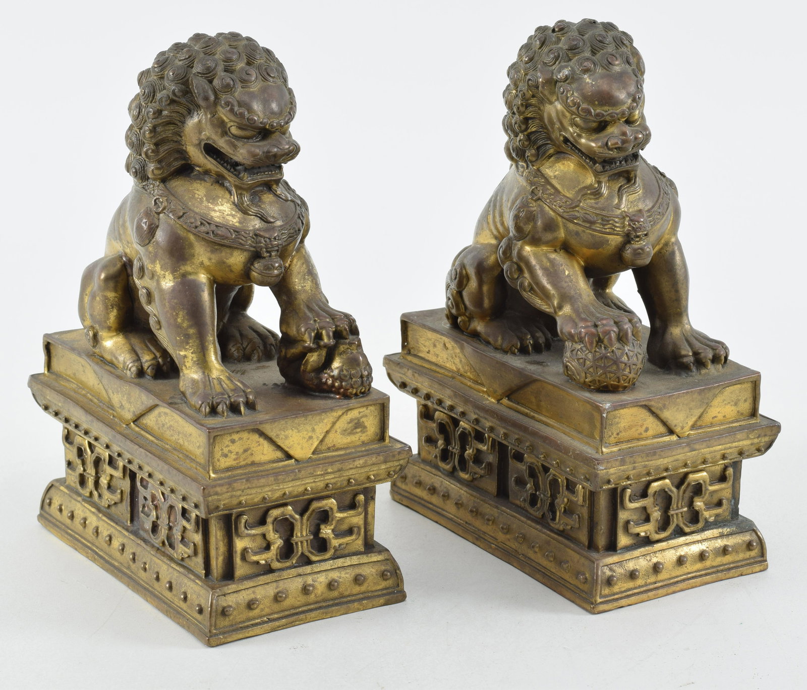 Pair of gilt bronze foo dogs. China. Early 20th century. 8 x 5.5 x 3.5in.: Pair of gilt bronze foo dogs. China. Early 20th century. 8 x 5.5 x 3.5in.