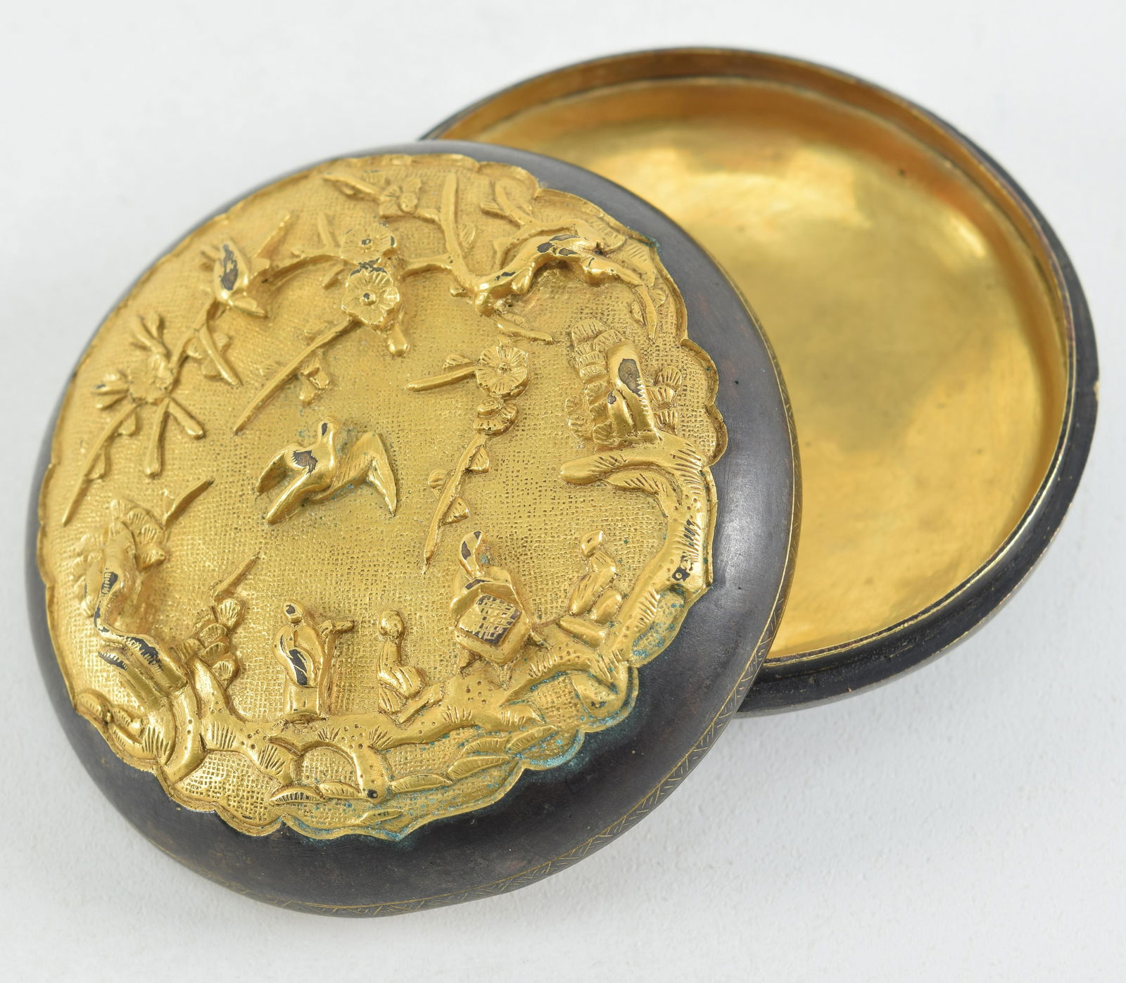 Shakudo box. China. Early 18th century. Surface decorated in high relief with figures and flowering (1 of 7)