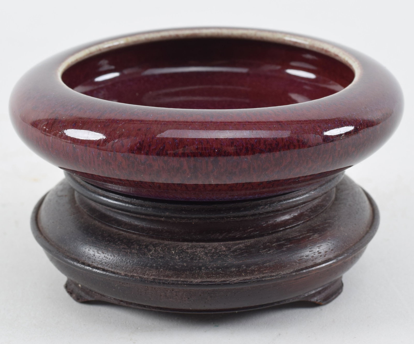 Brush washer. China. 18th/19th century. Lang yao glaze of a deep purple red. 4in diameter.: Brush washer. China. 18th/19th century. Lang yao glaze of a deep purple red. 4in diameter.