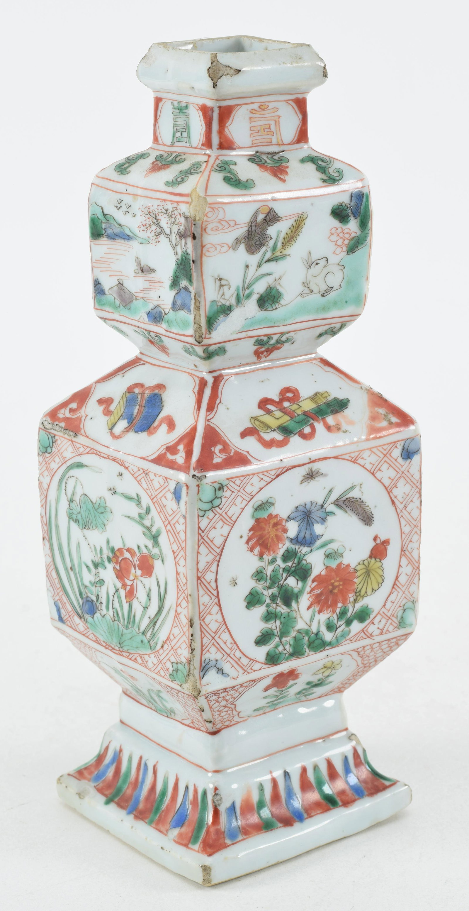 Porcelain vase. China. 18th century. Squared double gourd form. Famille verte decoration.: Porcelain vase. China. 18th century. Squared double gourd form. Famille verte decoration. Considerable rim fritting. 8.75in high.