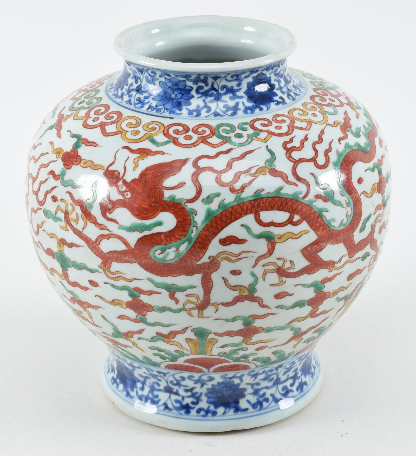 Porcelain jar. china. Early 20th century. Decoration of iron red dragons with underglaze blue scroll (1 of 8)