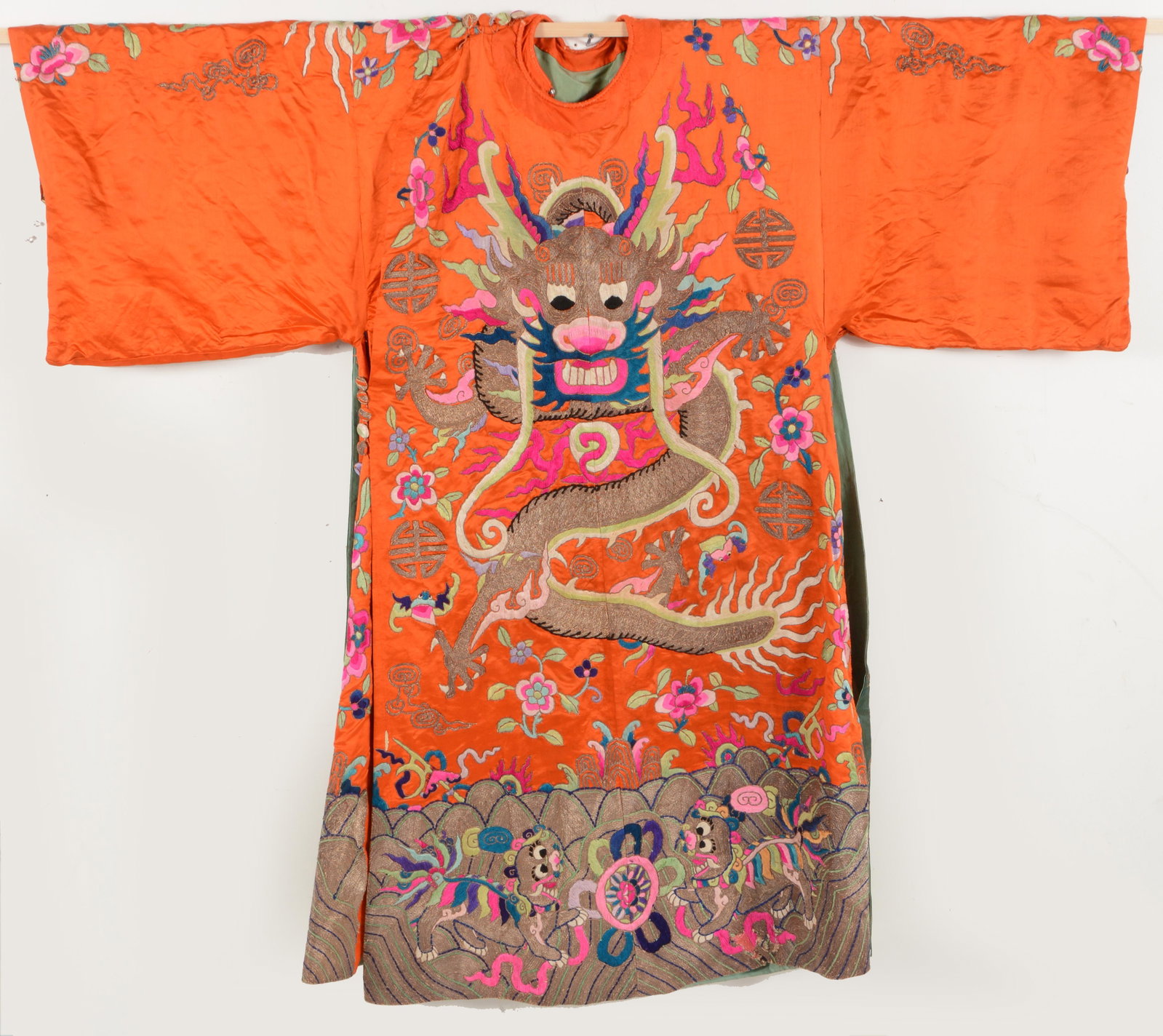 Theatrical robe. China. Ca. 1930. Dragon robe on an orange ground with metallic threads.: Theatrical robe. China. Ca. 1930. Dragon robe on an orange ground with metallic threads.