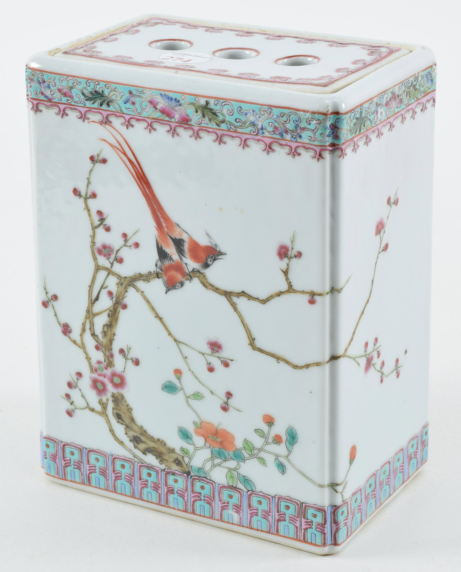 Porcelain pillow box. China. 20th century. Famille rose decoration of birds and flowers. 7 x 5 x: Porcelain pillow box. China. 20th century. Famille rose decoration of birds and flowers. 7 x 5 x 3.5in. Chien Lung mark. Small flake chip on underside of one corner of lid.