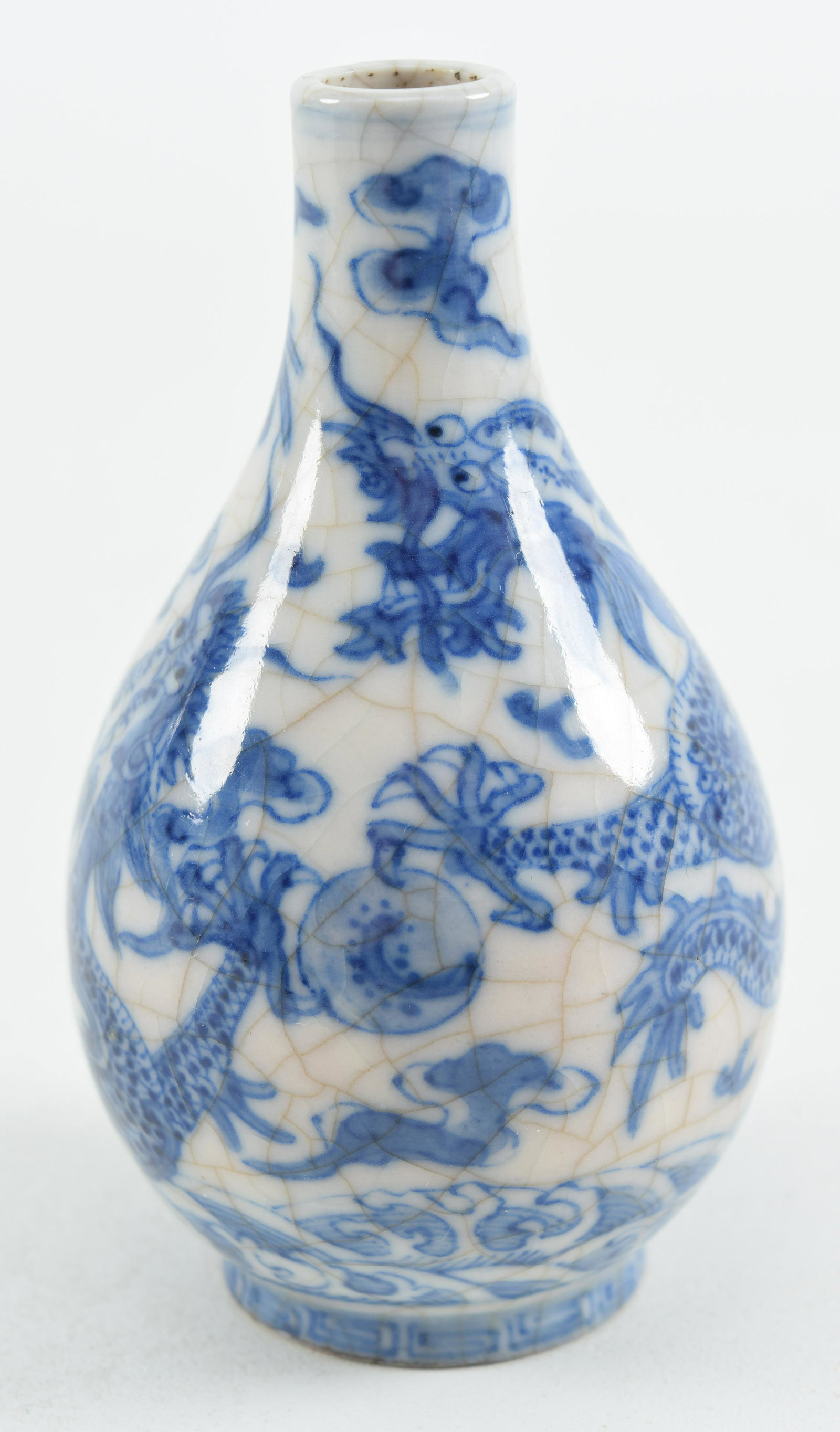Miniature vase. China. 19th century. Hua Shih Yao. Hanging Gal form. Underglaze blue decoration of: Miniature vase. China. 19th century. Hua Shih Yao. Hanging Gal form. Underglaze blue decoration of dragons. Yung Cheng mark. 3in high. From a 100-year-old Newport, Rhode Island collection.
