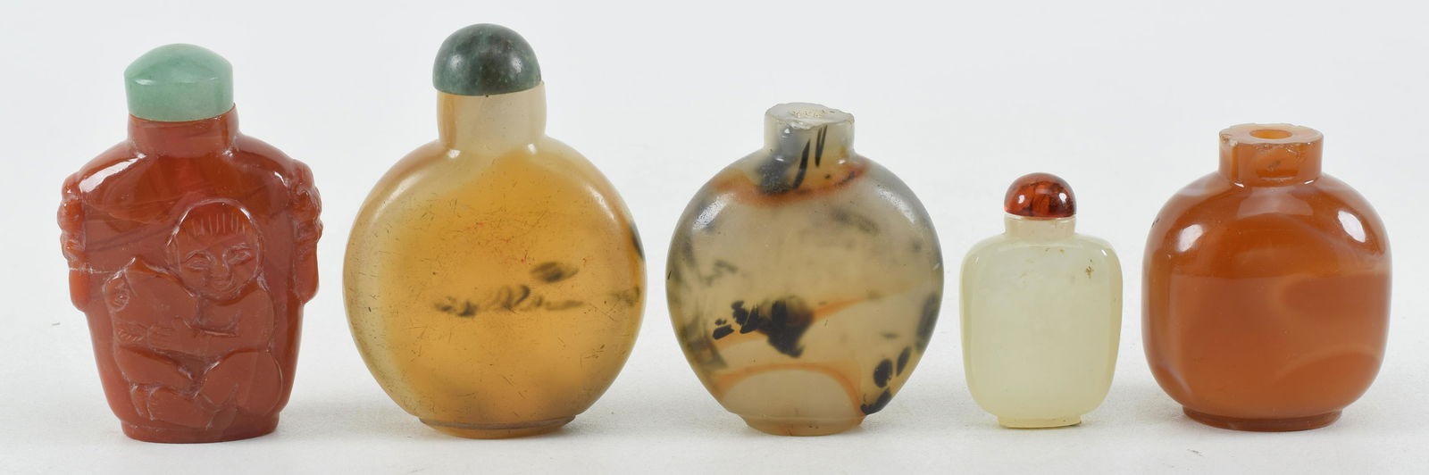 5 snuff bottles. China. Late 19th/early 20th century. To include: 3 peking glass to resemble agate, (1 of 9)