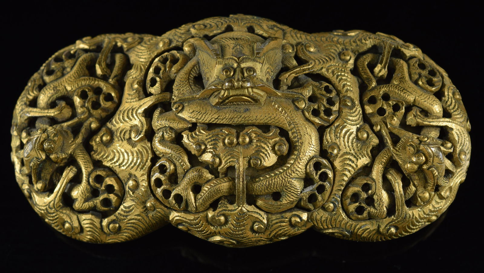Gilt bronze buckle. China. 19th century. Design of dragons and clouds. 3in. (1 of 4)