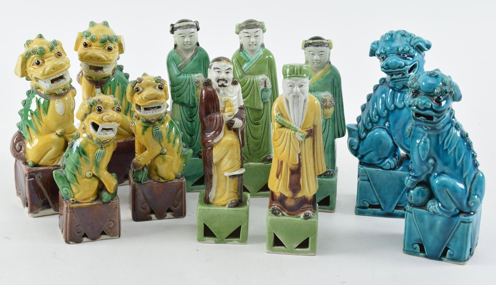 Lot of 11 porcelain figures, China 20th Century. To include; 6 foo dogs and 5 figures of the immorta: Lot of 11 porcelain figures, China 20th Century. To include; 6 foo dogs and 5 figures of the immortals. Largest 8.24 in