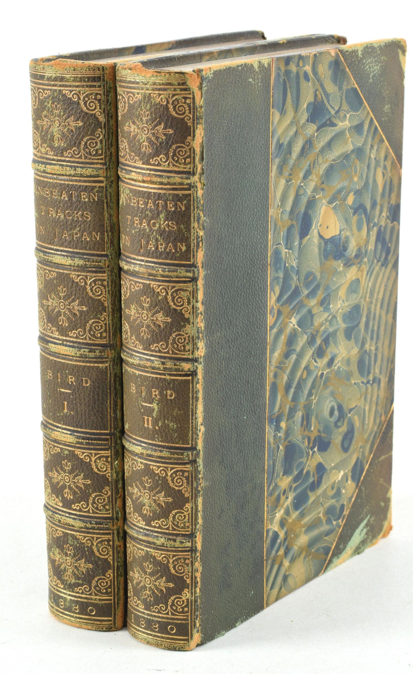 Unbeaten Tracks in Japan. Isabella Bird. London: John Murray, 1880. Complete in 2 vols. Fold out map: Unbeaten Tracks in Japan. Isabella Bird. London: John Murray, 1880. Complete in 2 vols. Fold out map of Japan and numerous illustrations. Three-quarter green leather binding with marbled boards. Hinge