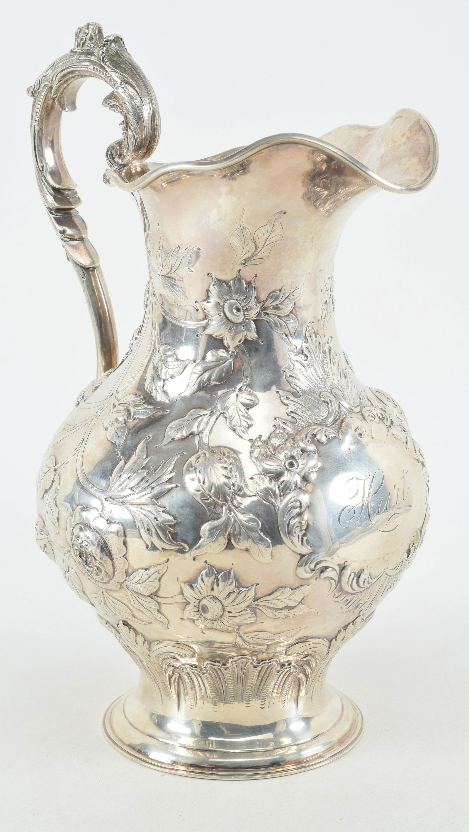 J. & L. Cox New York silver water pitcher with floral and leaf repousse decoration. Cartouche with (1 of 9)