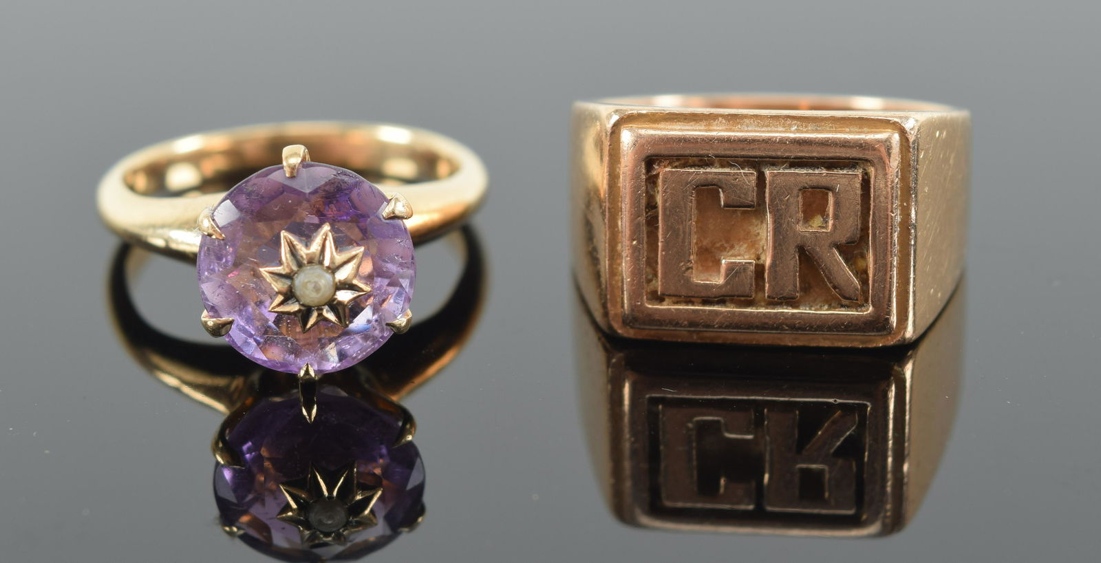 2 gold rings. 1) 14K marked amethyst mounted ring. 2) Heavy gold ring. Tests as 14K or better. 14.8 (1 of 7)