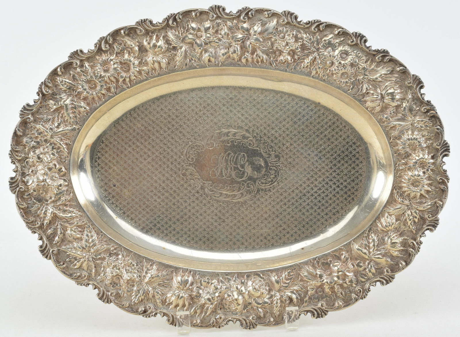 Baltimore sterling silver floral repousse decorated deep oval tray. Engraved geometric pattern well. (1 of 10)