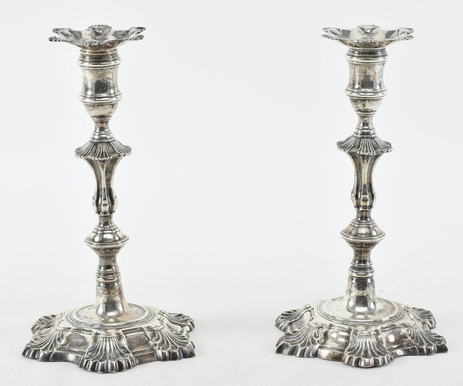 English Georgian silver cast candlesticks. London. 1751. By John Cafe. Marked inside bases. Petal (1 of 11)