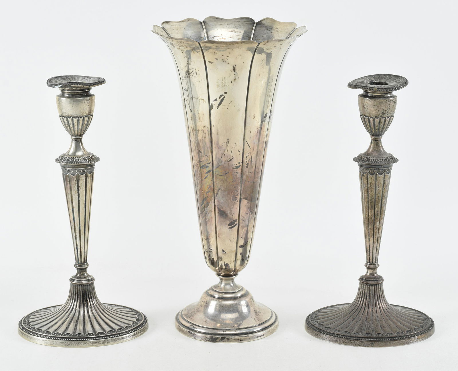 Weighted sterling silver tableware. 1) Large trumpet vase with flared, cut edge and fluted body. (1 of 7)
